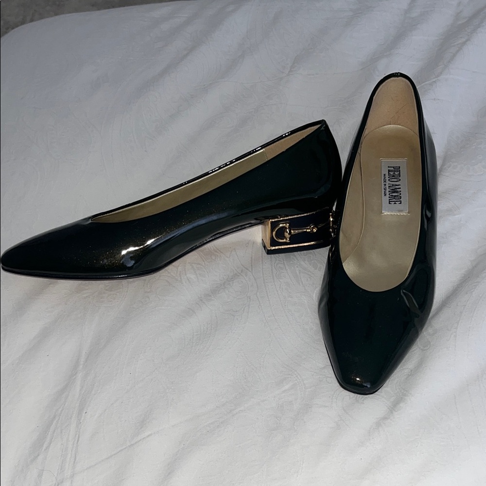 Green patent leather shoes with gold horse bit detail